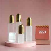 Bijela staklena boca za ispuštanje